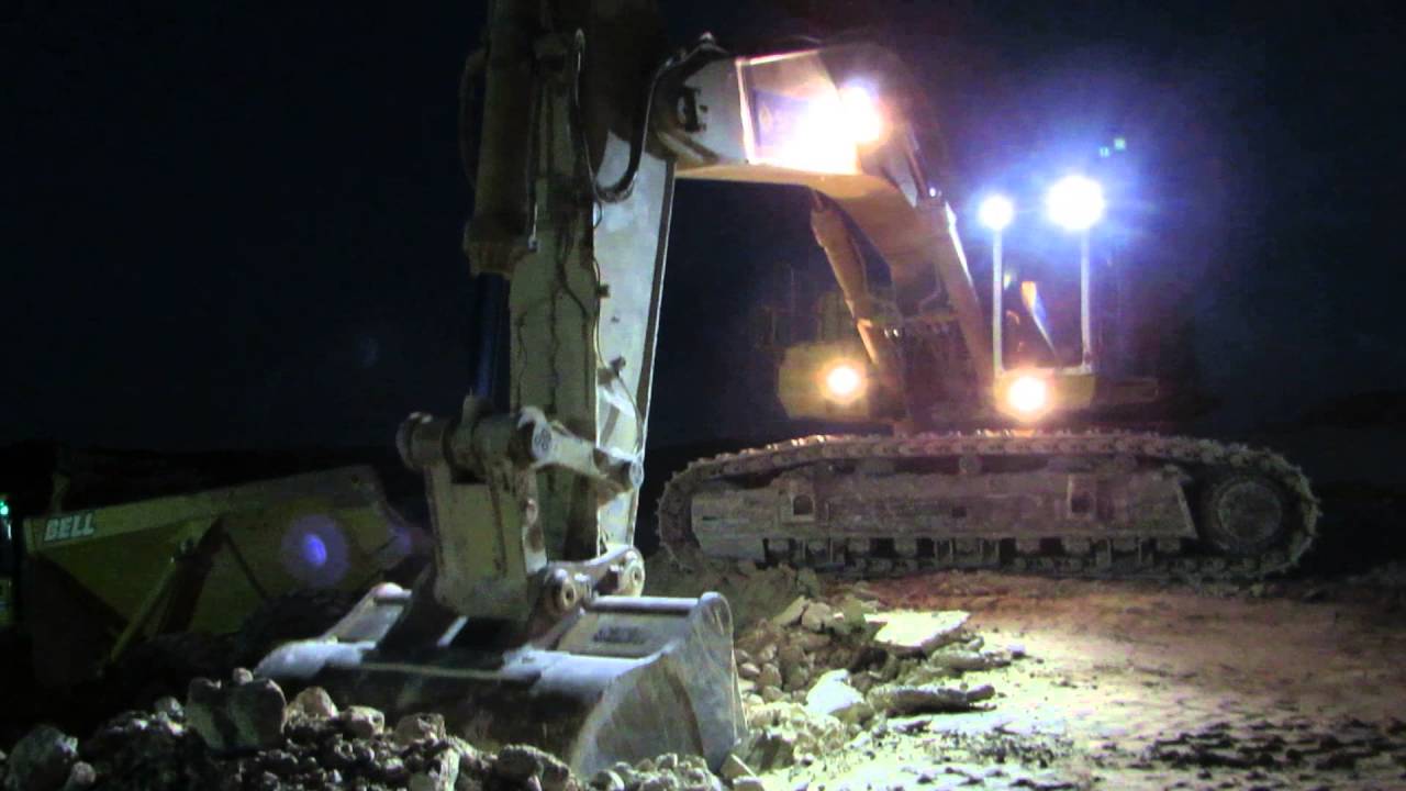 💪 High productivity - Caterpillar 385B loading Volvo A40F and Bell B45D