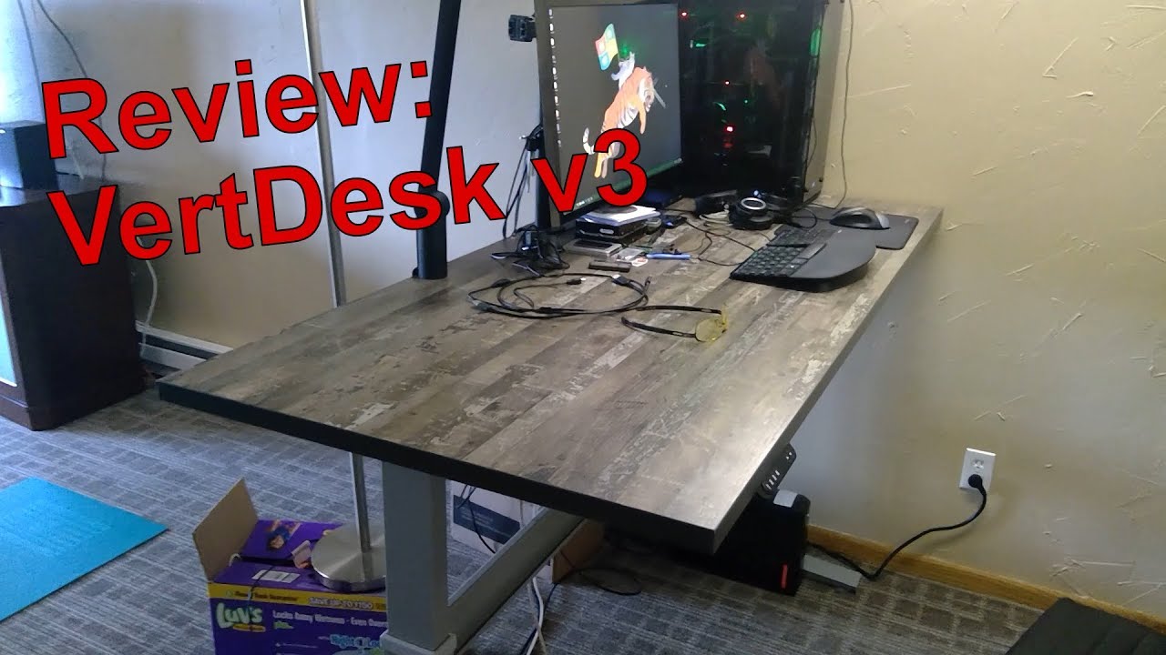 Обзор VertDesk V3 за дверью офиса