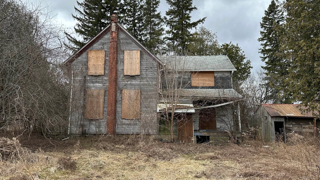 I made a terrifying discovery at this Super creepy ABANDONED house (found grave stones!)