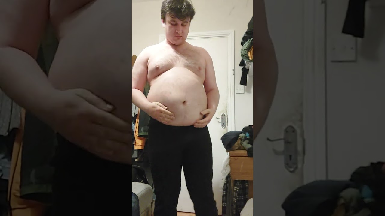 Trying on old trousers 