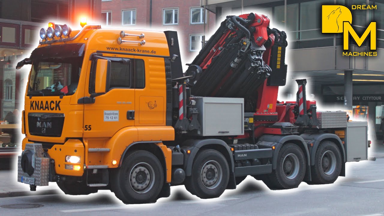 Powerful Palfinger PK110002 crane MAN truck chassis lifting steel beams look at this clever concept