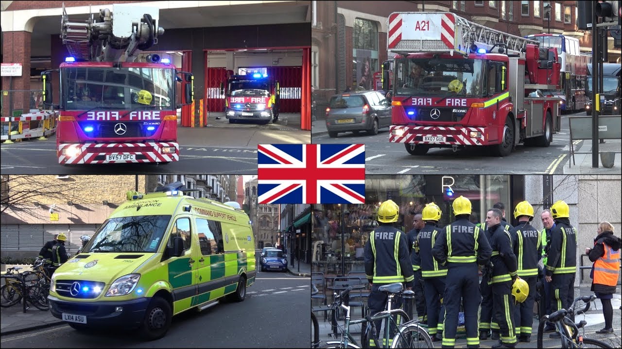 High rise - Fire trucks and ambulances responding with siren and lights in London