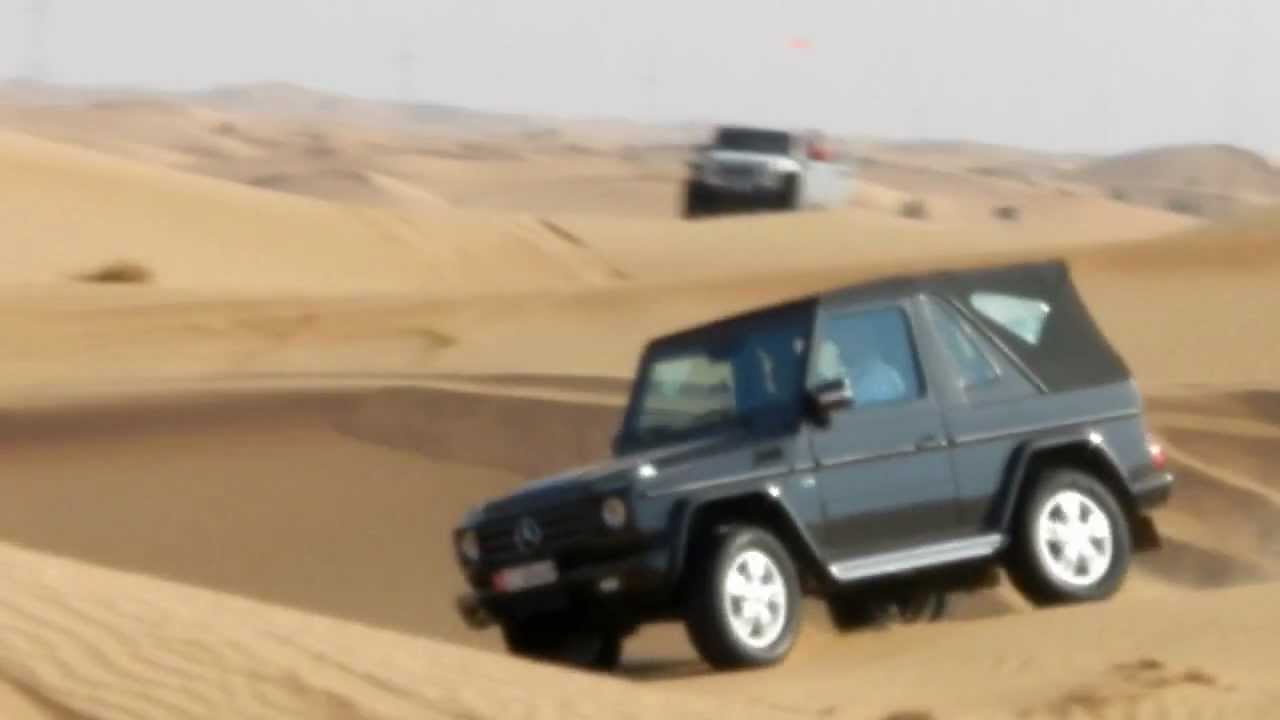 Mercedes G500 attacking sand dunes