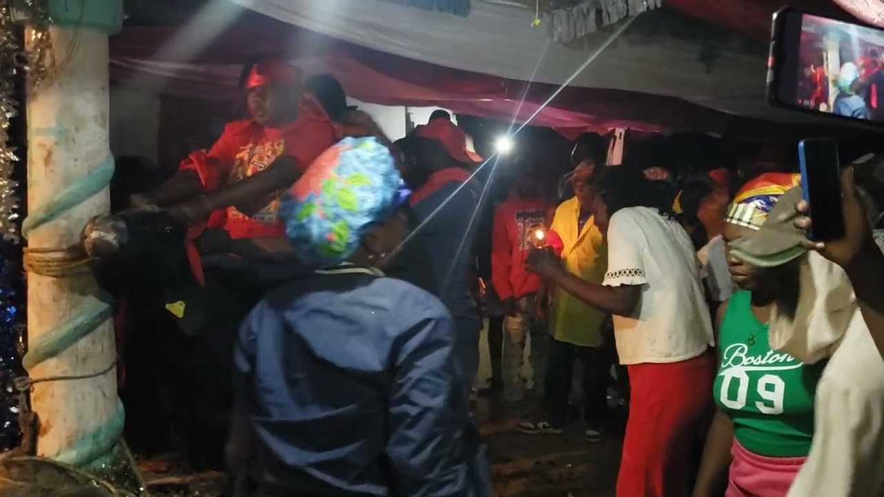 Manbo Guerlande ak bòkò Lucien tap bay Djab la manje 