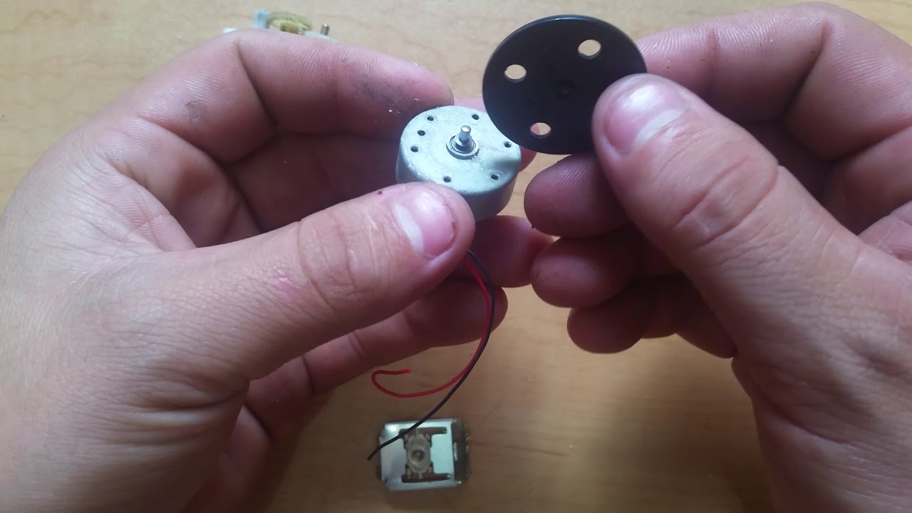 Imanes de Neodimio y otros componentes resiclados de un lector de DVD o CD