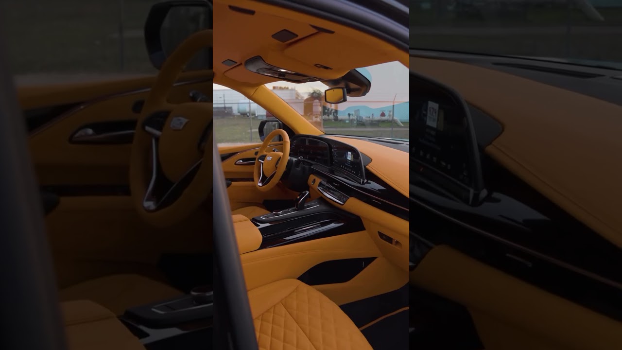 Custom Cadillac Escalade with Hermes Orange Interior and 26