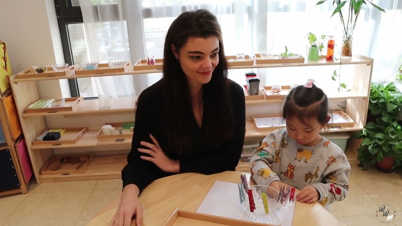 Practical Life: Teaching children how to use clothes pegs
