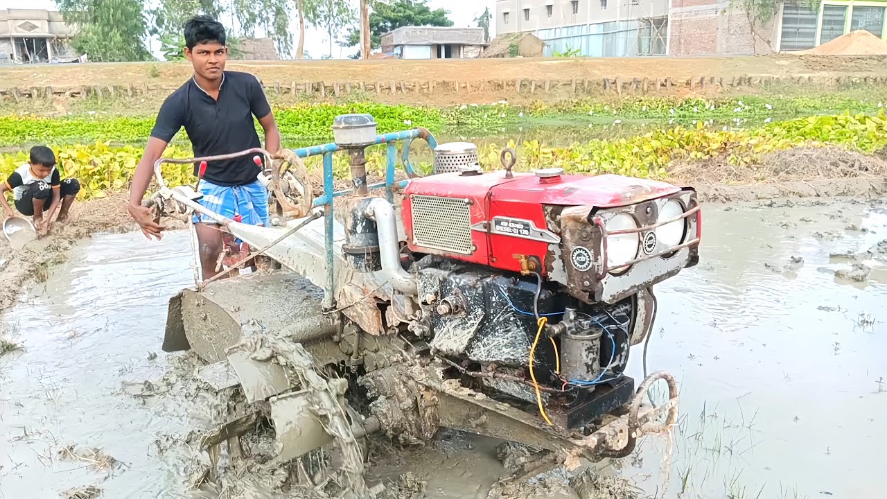 Working in the mud, my car is a double driver.||kamco power tiller @PramodsLife@KHAWorkBD