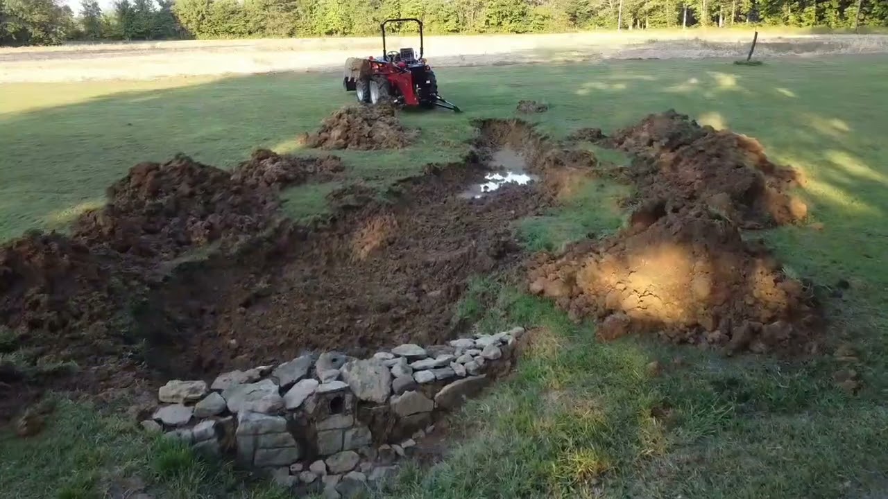 Digging pond with RK37 tractor
