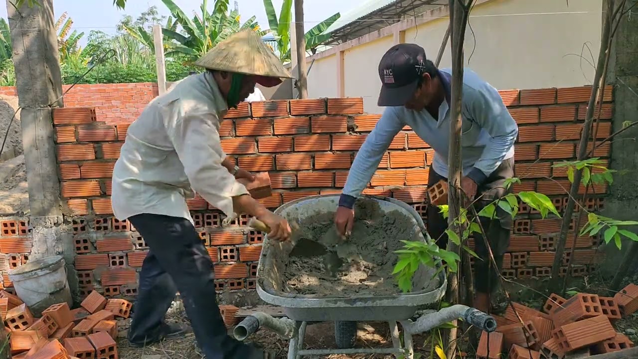 xây tường hàng rào kiểu này rất đẹp và chắc chắn
