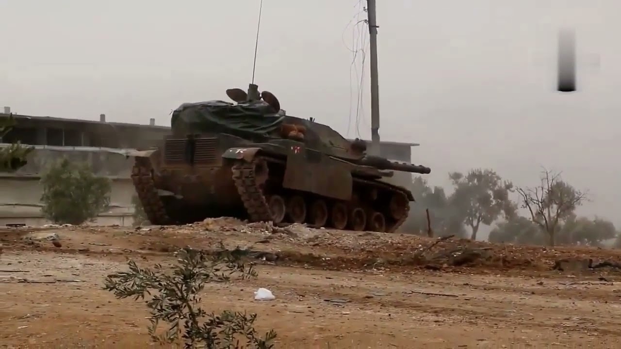 A Turkish M60T shells ISIS positions on Sheikh Aqil Hill 