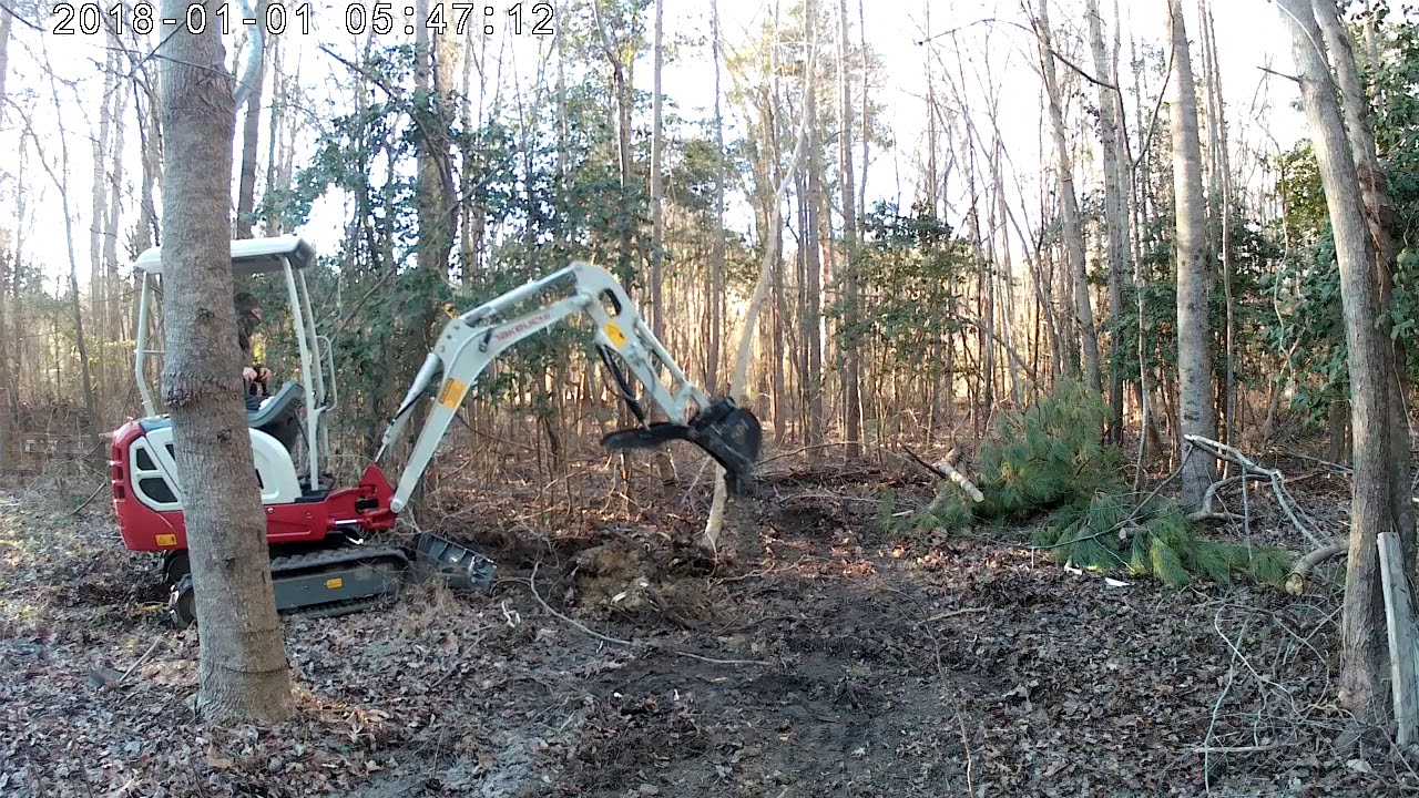 TB216 outside view clearing trees.
