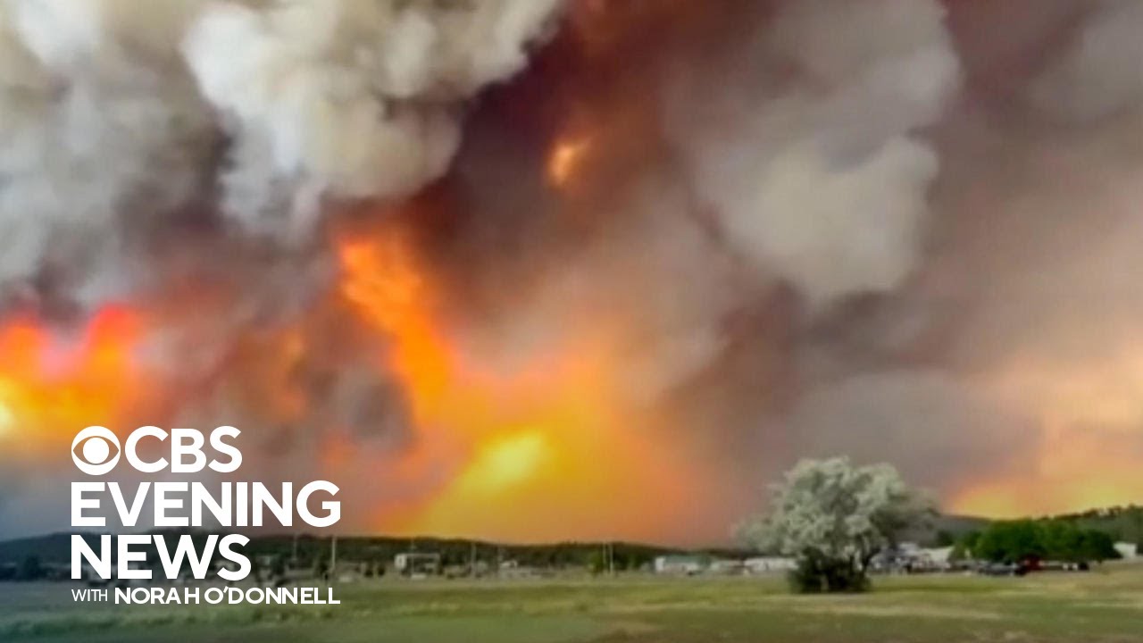 Fast-spreading wildfires force evacuation of New Mexico town