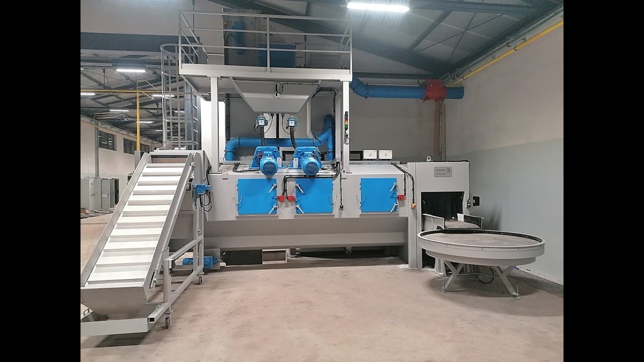 Continuous tumble belt blast machine type GPP 400