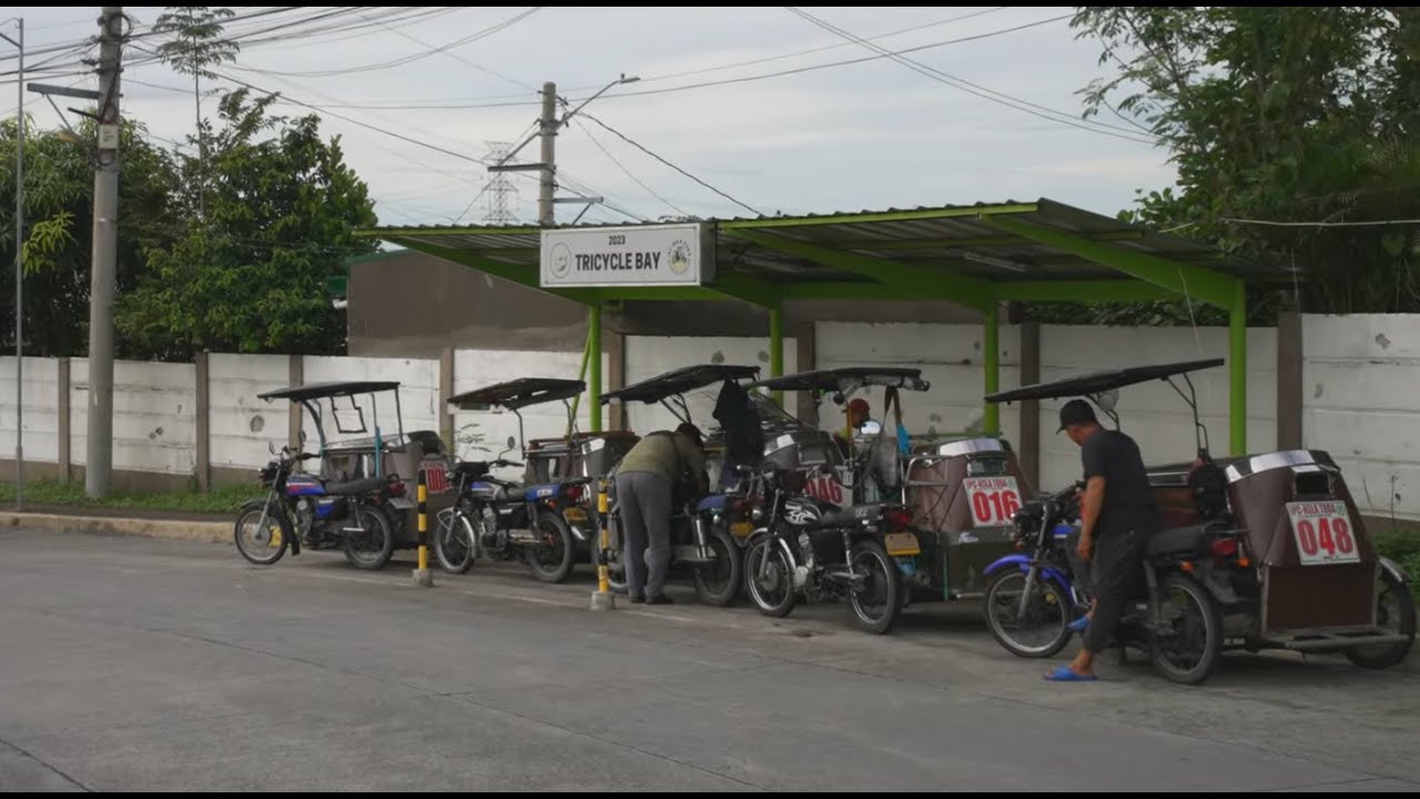 Philippines, tricycle ride from NuVista Homes to Starmall