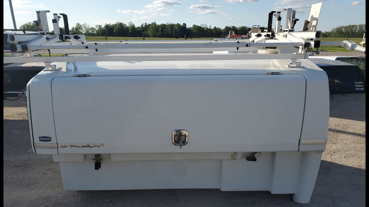 Walkaround used SpaceKap Compak Slide in Truck cap for sale. Fits full size short bed truck 6.5'