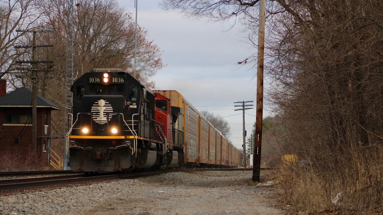 CN train E251 goes past Holly MI with a IC Deathstar SD70 and a CN C44-9WL 