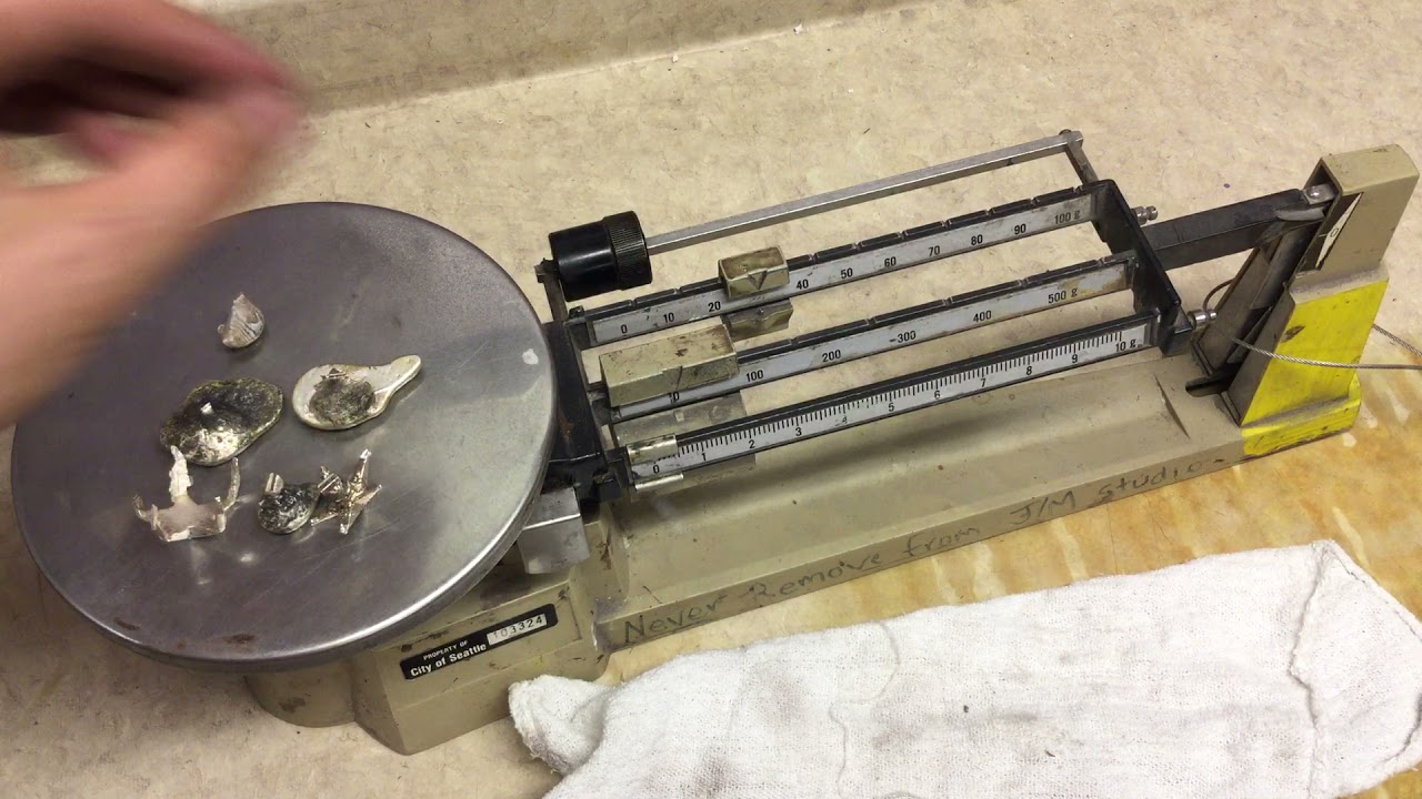 Using a triple beam balance