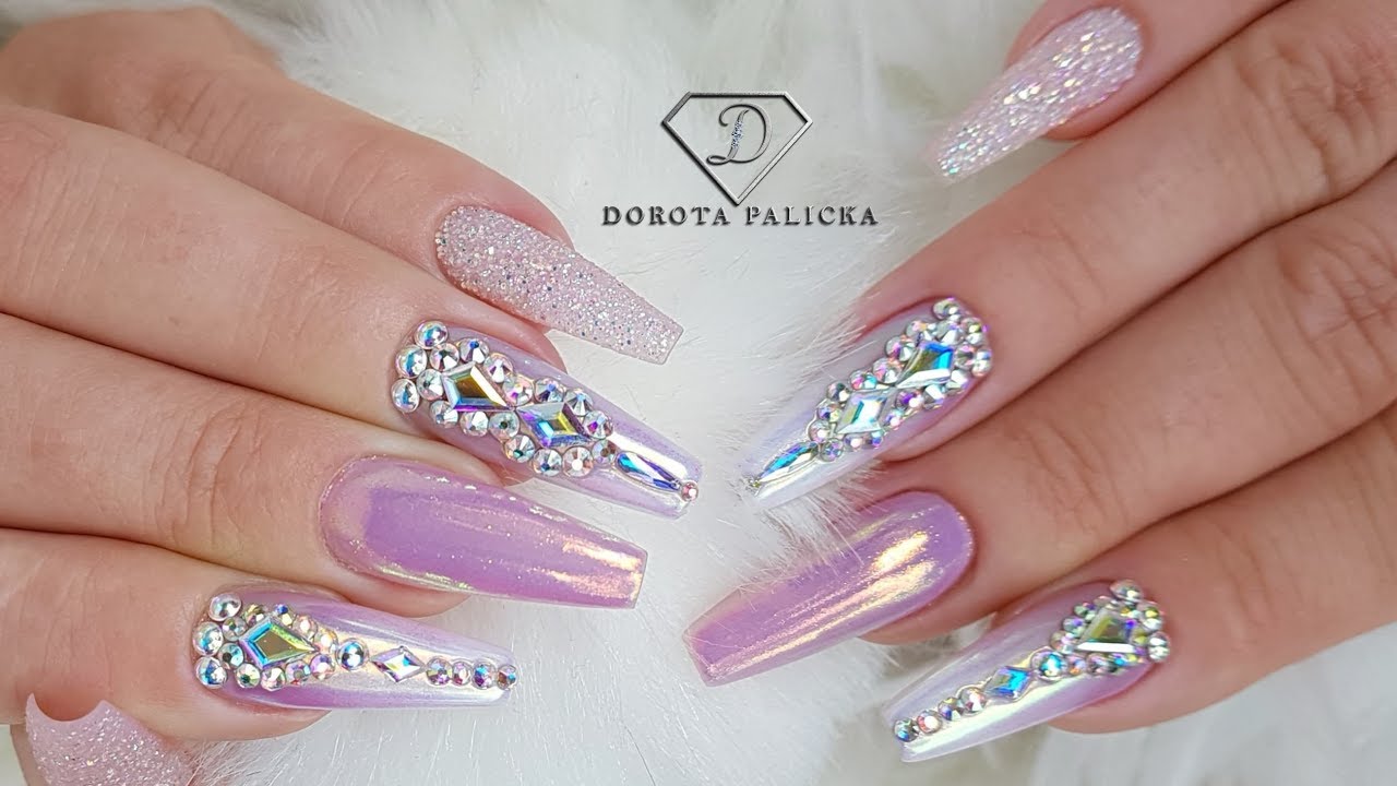 Pink nails with Swarovski Crystals, sugar nail art and Aurora chrome pigment. Gel ombre nail art