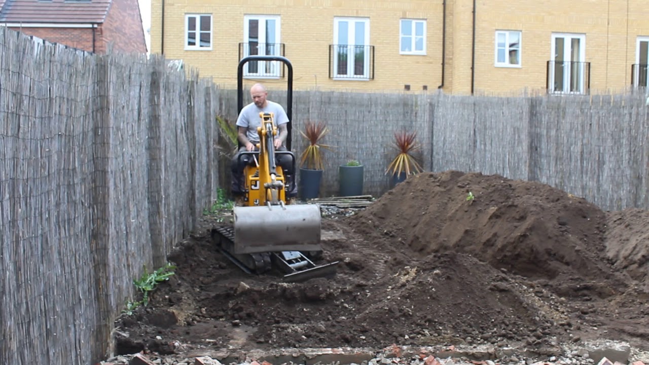 My JCB 8008 levelling off a rear garden for artificial grass