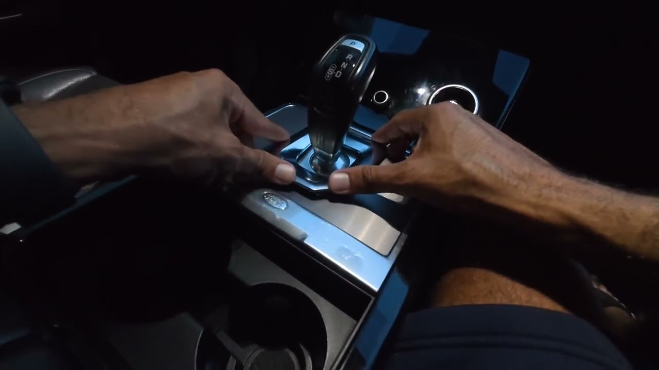 RR EVOQUE HOW TO REMOVE THE CENTER CONSOLE TRIM AND EVO GETS A NEW HOOD WEATHERSTRIP REPLACEMENT