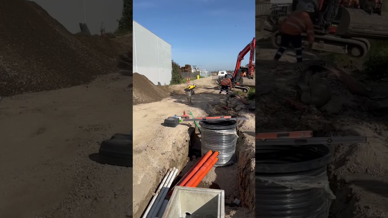 Rail cable route installation with excavators