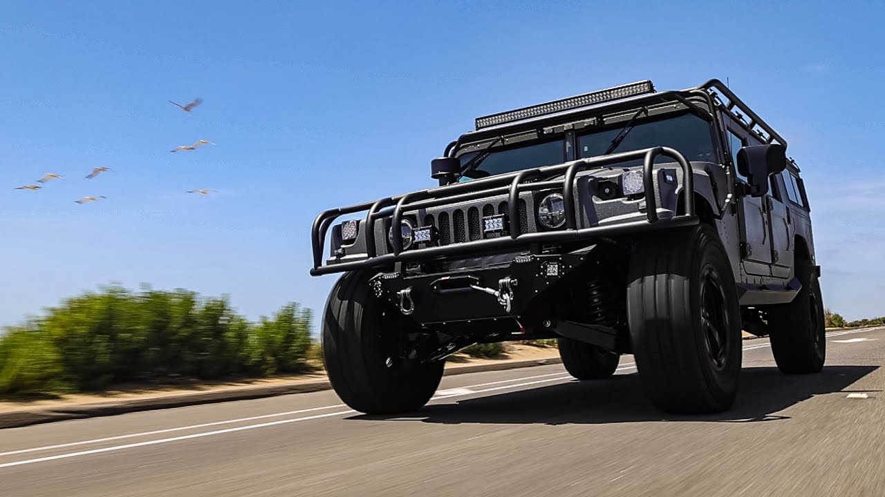 PREDATOR INC'S 6 PASSENGER HUMMER H1