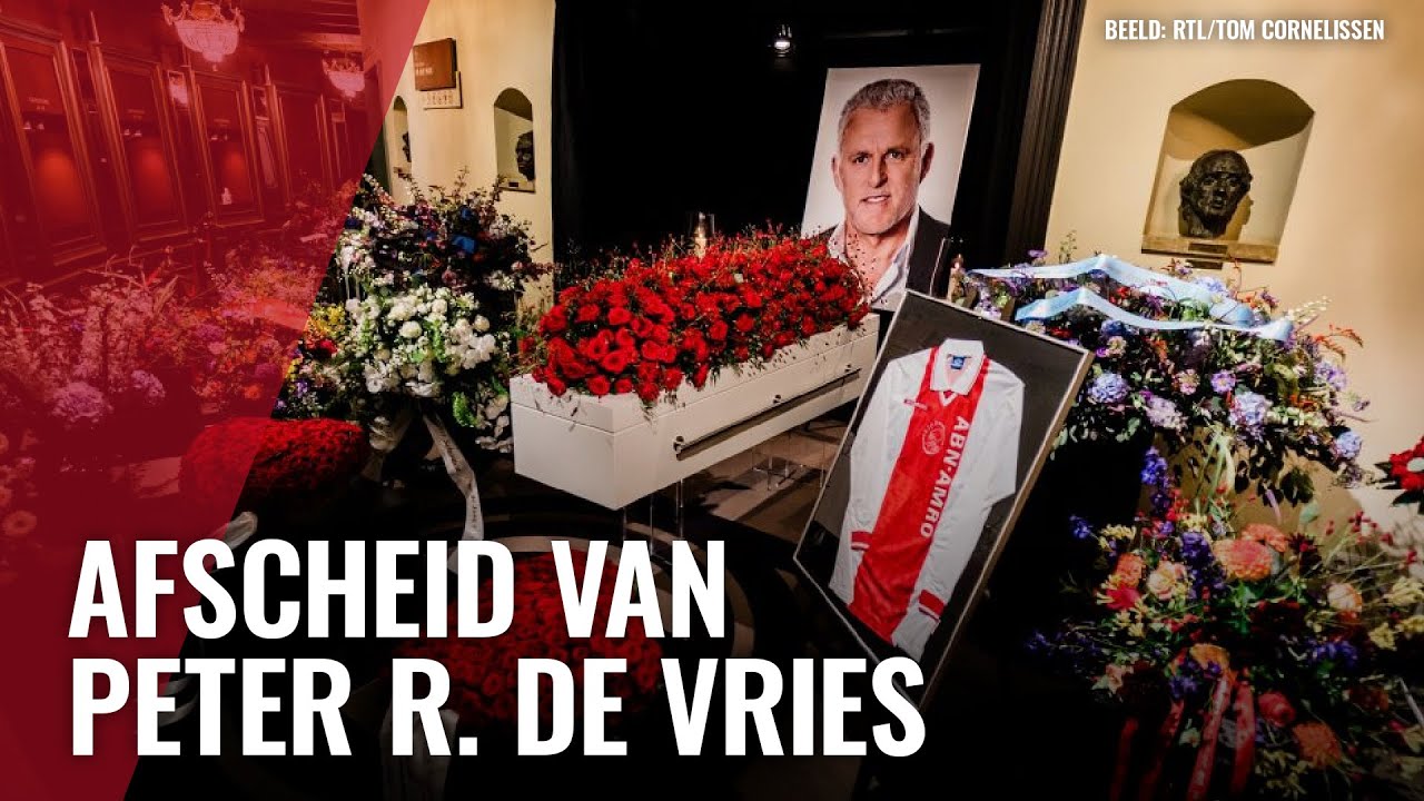 Kist Peter R. de Vries bezaaid met rozen