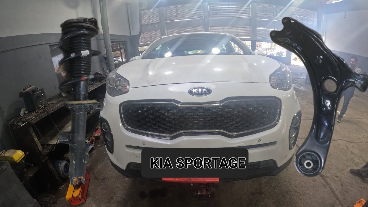 reemplazo de amortiguador y brazo de control kia sportage 2018
