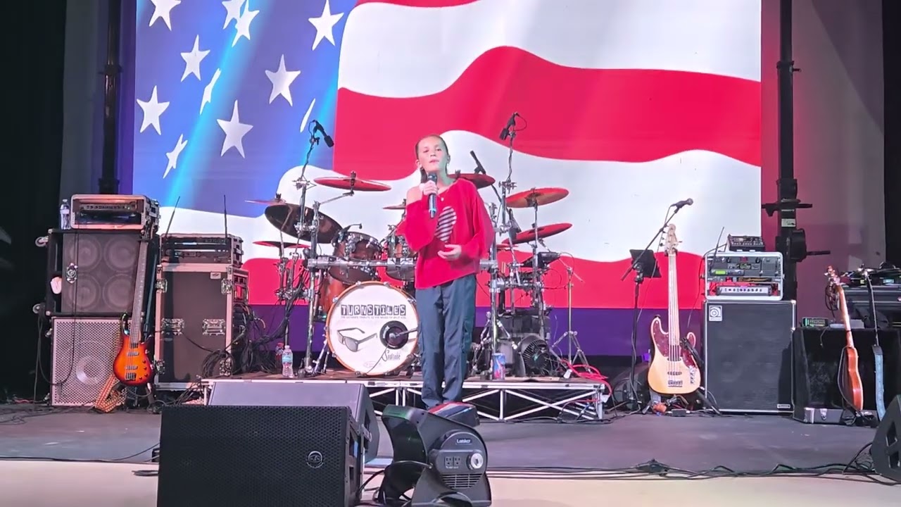 11 yr old Cheyenne Morris singing the National Anthem for Wellington 30yr anniversary event