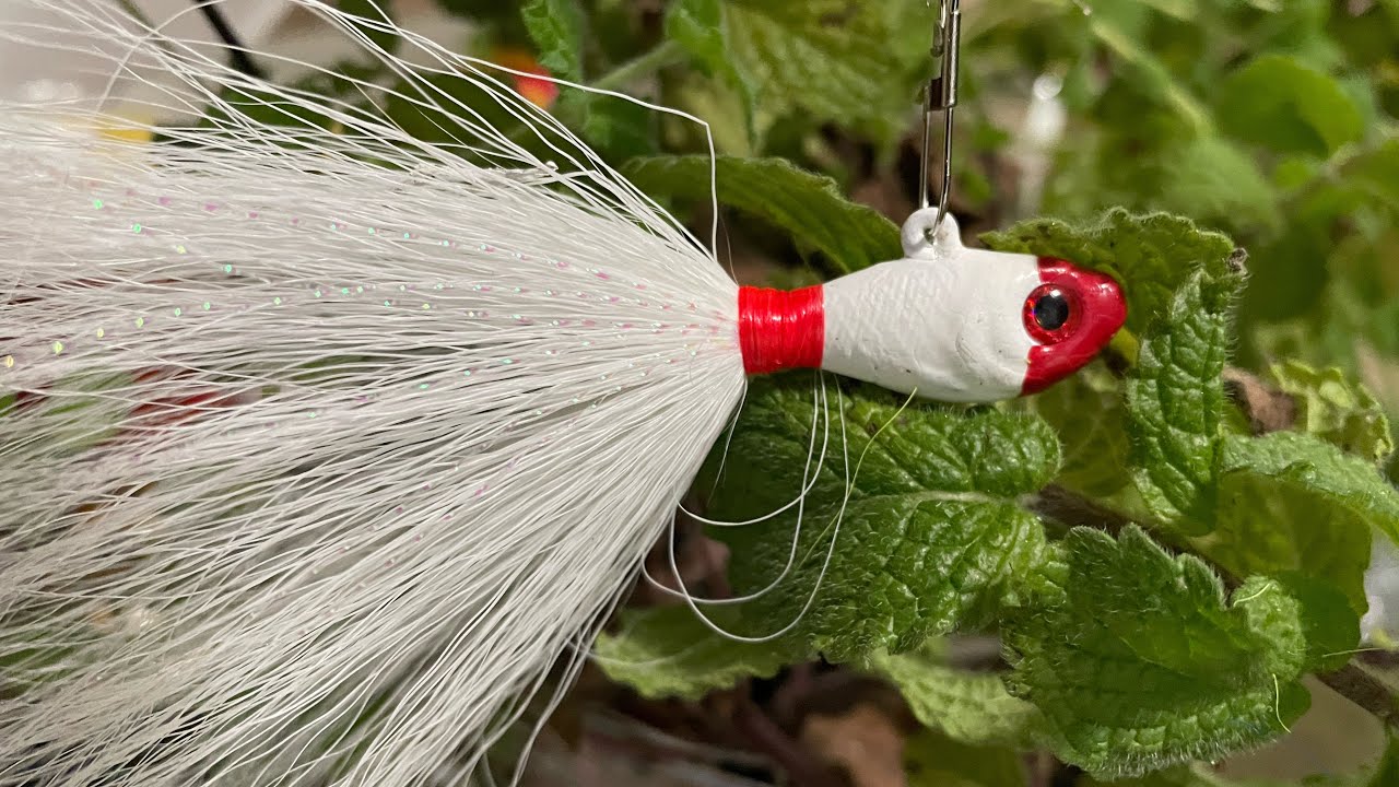Como hacer plumillas para pescar.  (Bucktail jigs)
