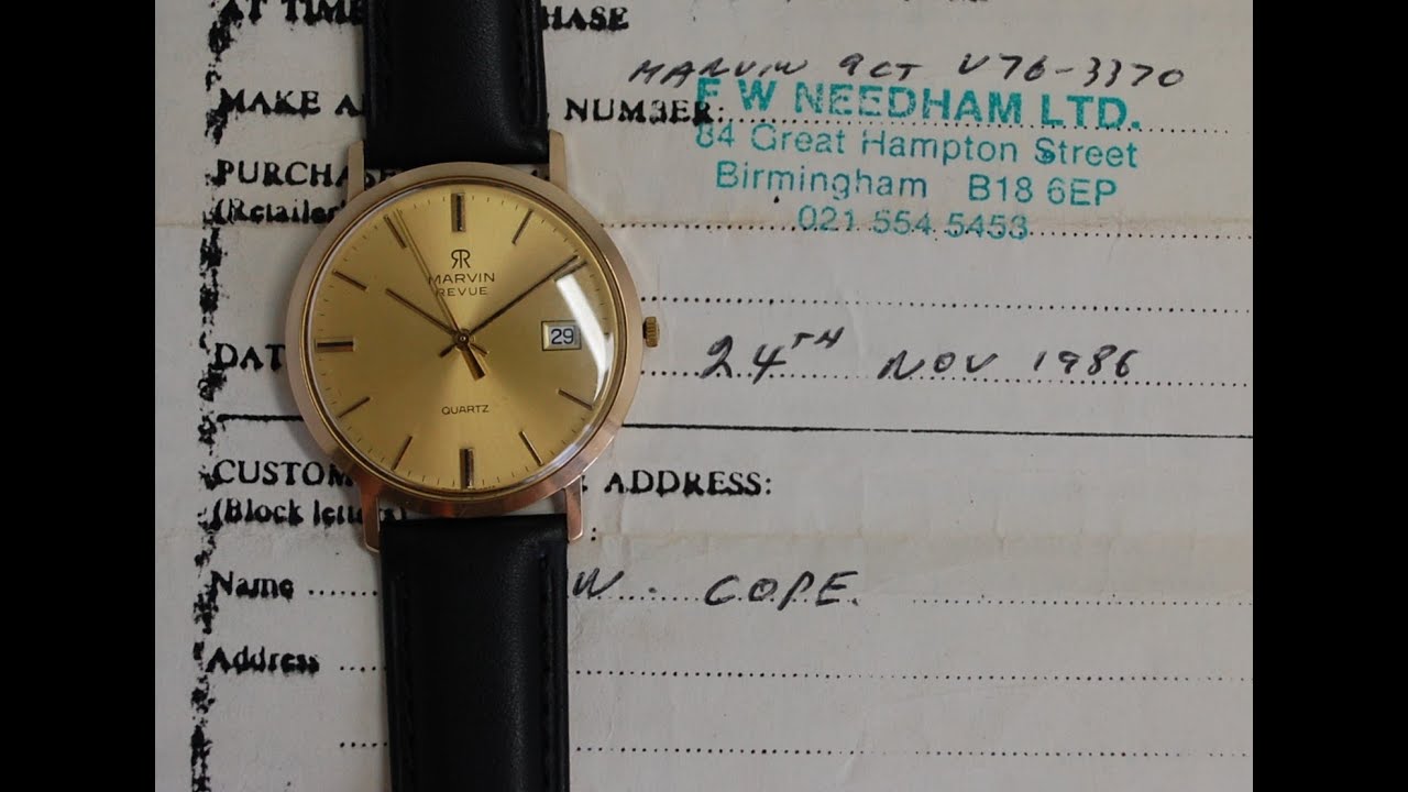 1986 Marvin Revue men's 9k gold vintage watch with box and papers