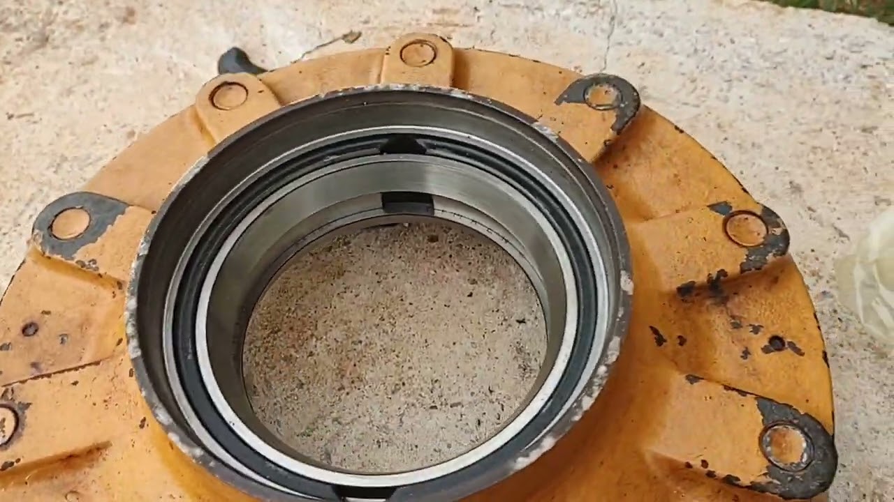 trocando o rolamento da roda traseira da retroescavadeira 580 m case