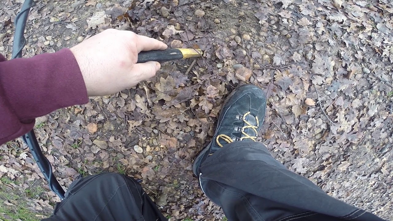 Metal detecting in Surrey, WW2 Casings, Army uniform Button, Silver coin and copper coins.