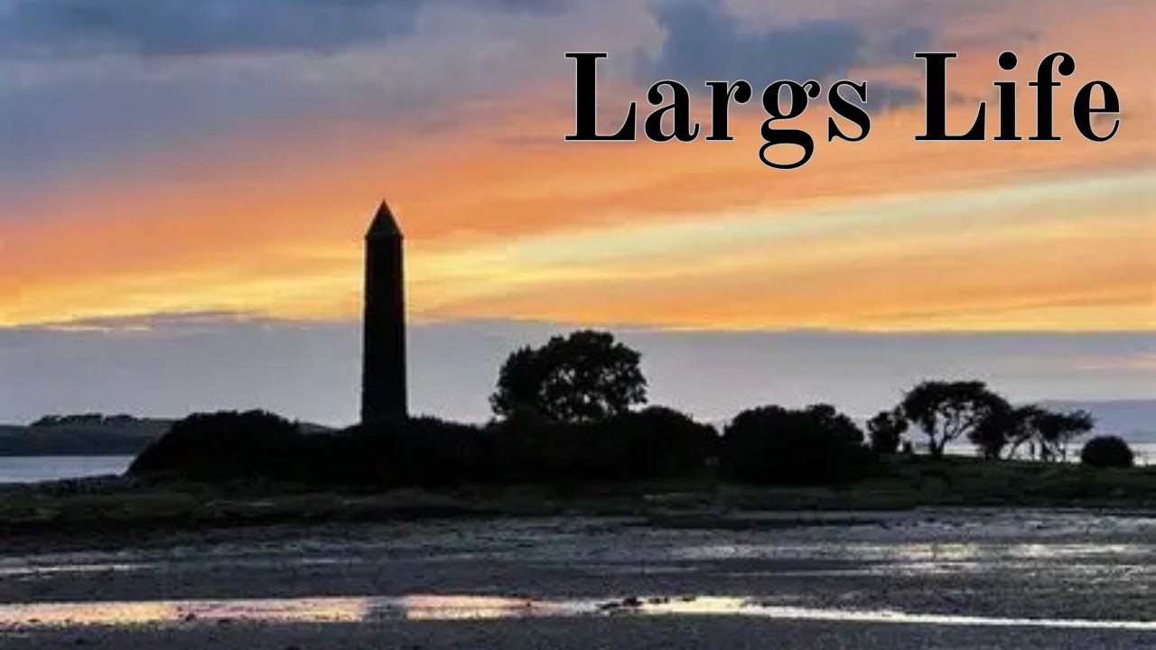 We walk to the Largs pencil monument & get some food at Largs Marina