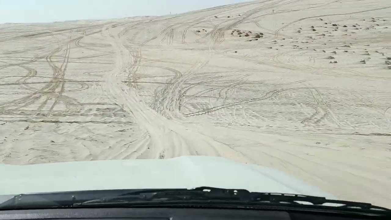 Dunebashing. Doha desert safari inland sea Qatar 