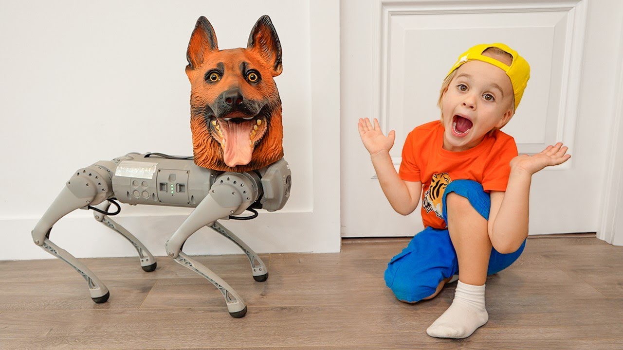 Chris bir evcil hayvan sahibi olmak istiyor ve robot k&ouml;pekle oynuyor