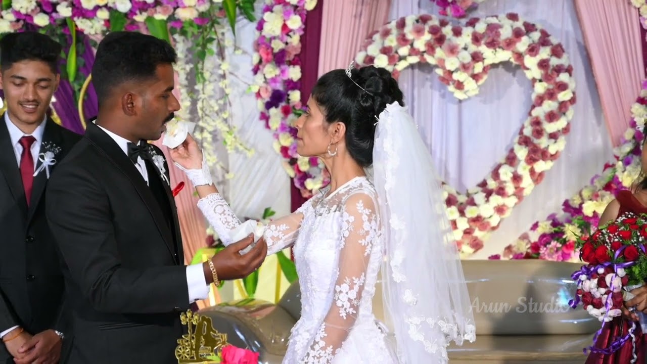 Mangalore Catholic Wedding Highlight Santhosh & Anjali. Videos By Arun Studio Venur. Ph: 9535434448.
