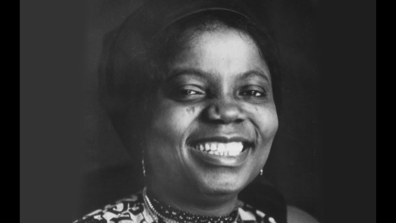 A Tribute to Buchi Emecheta by her 1st son, Sylvester Onwordi & a Dirge by Prof Akachi Ezeigbo