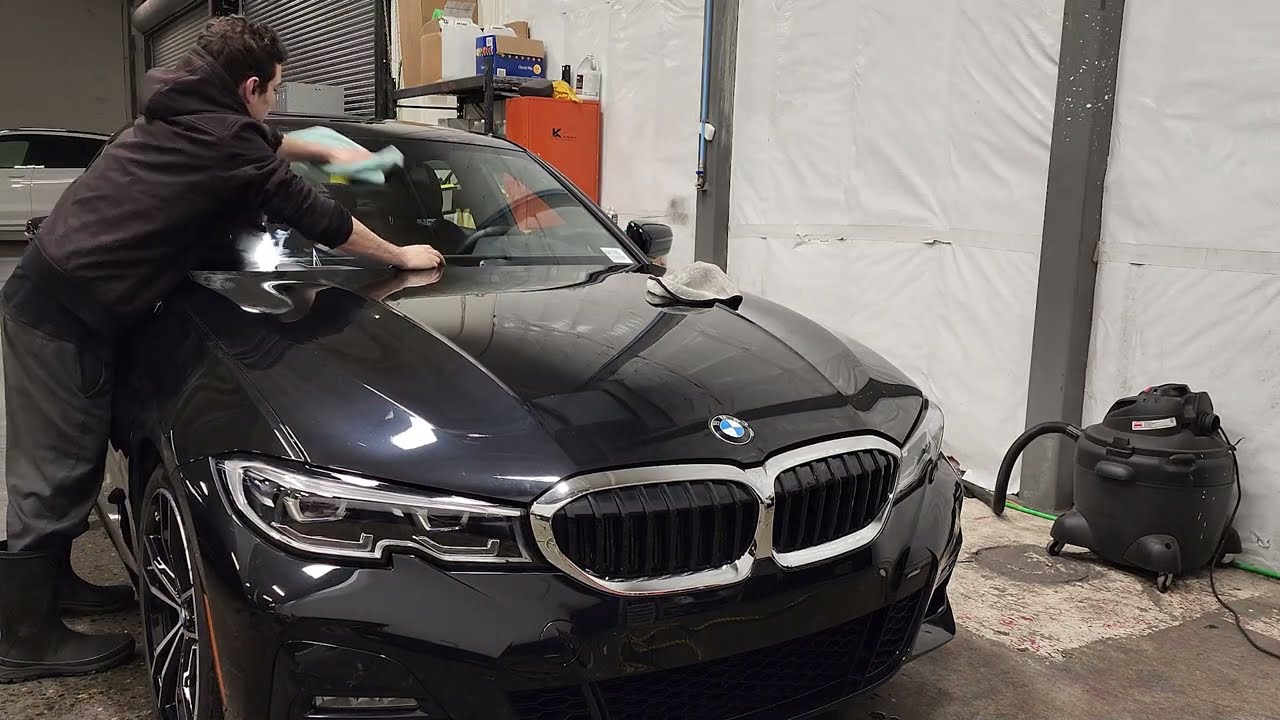 Griots ceramic products applied and demoed on a black BMW 330i