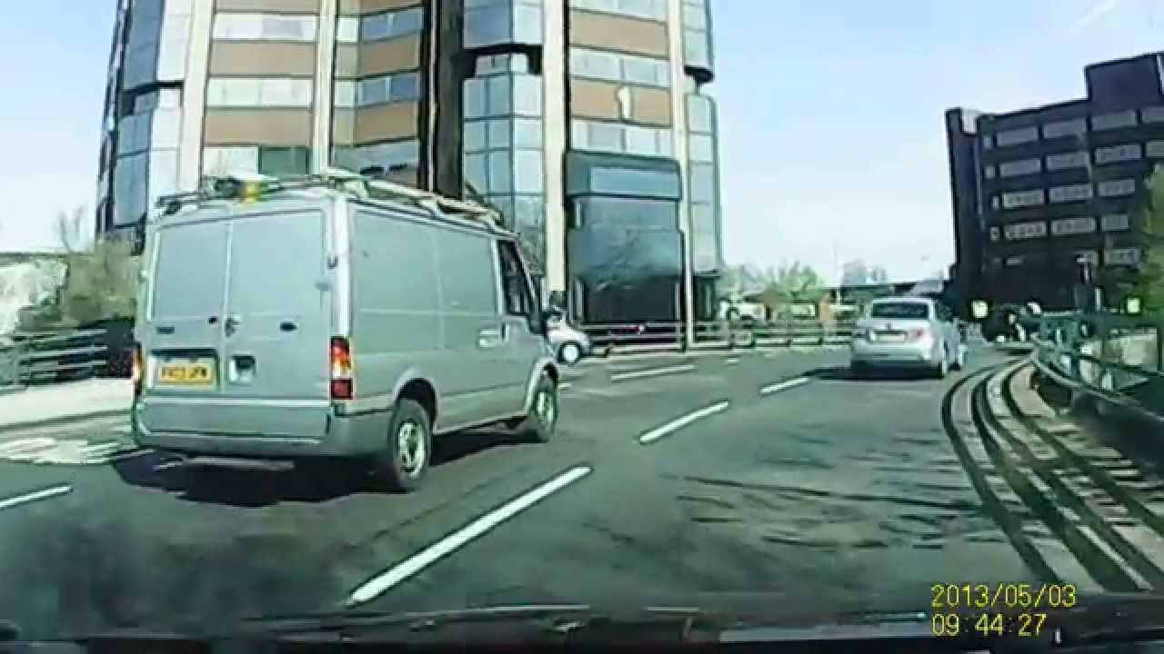 Bad driving on Five Ways roundabout Birmingham UK - Van driver cutting into lanes