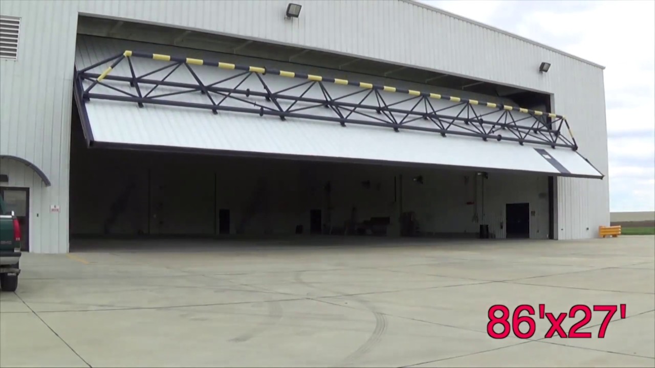 Hangar Door dimensions 86 ft x 27 ft - by Higher Power Hangar Doors
