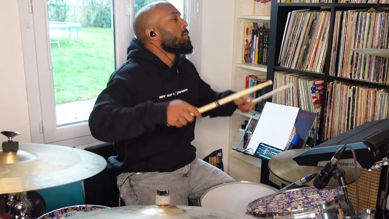 Ismael Nobour Practicing Awa Ly's New tune " Le feu" in his home recording studio 