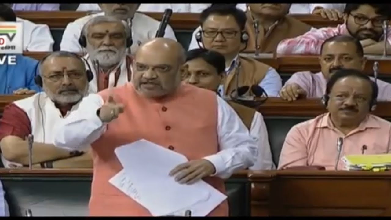 Amit Shah introduces Kashmir bills, resolution in Lok Sabha, says Jaan denge for PoK
