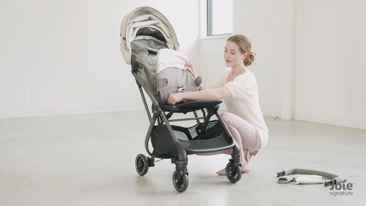 Come mettere il rivestimento del passeggino Joie Tourist