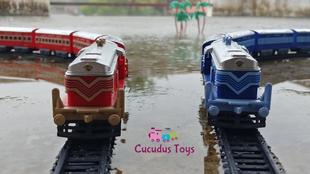 Centy toy trains on parallel tracks | Toy Trains Galore | epic train crossing in heavy rain