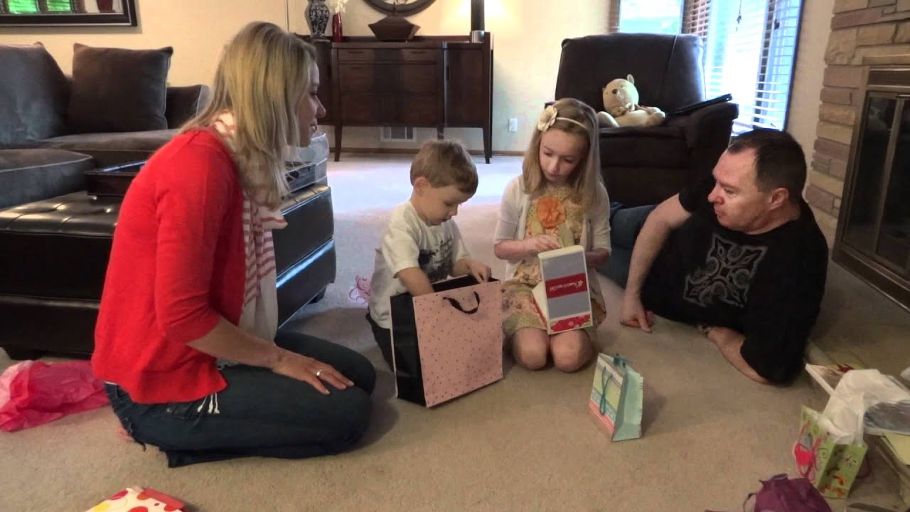 Emma opening presents on her 8th birthday May 30 2011.MTS