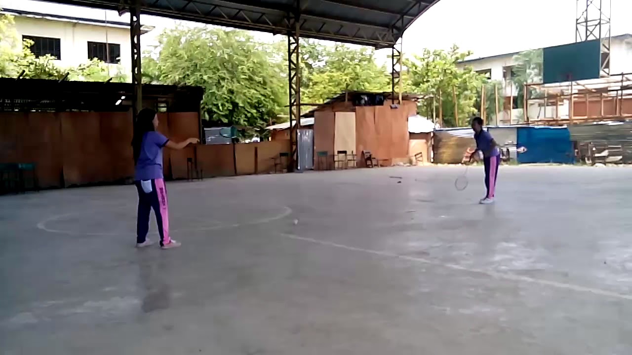 Playing Badminton at school with friends