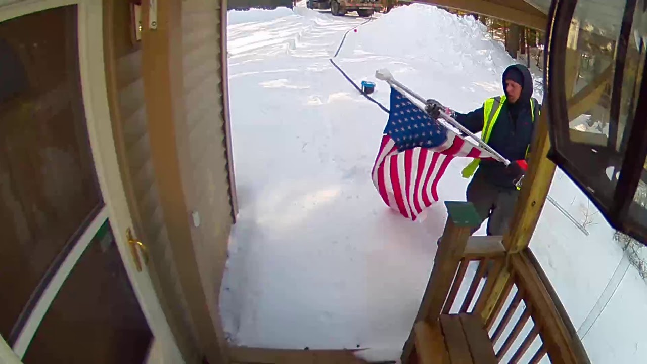 Dead River delivery driver respecting the flag
