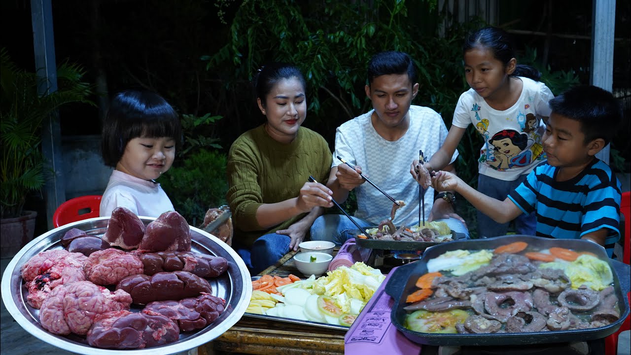 Country family make yummy BBQ - Mother and children cooking